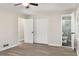 Bedroom includes a closet and ensuite bathroom with gray wood-look flooring at 2694 Hickory Valley Dr, Snellville, GA 30078