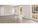 Living room featuring luxury vinyl plank floors, and lots of natural light at 2694 Hickory Valley Dr, Snellville, GA 30078