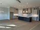 Open kitchen features a large island, recessed lighting, and stainless appliances at 4209 Legacy Ln # 31, Acworth, GA 30101