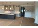 Well-lit kitchen area with an island, custom cabinets and stainless appliances at 4209 Legacy Ln # 31, Acworth, GA 30101