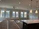 Bright living room with large windows, ceiling fan, and recessed lighting at 4209 Legacy Ln # 31, Acworth, GA 30101