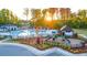 Relax by the community pool, featuring a playground and gazebo area at 1119 Blue Juniper Circle, Loganville, GA 30052
