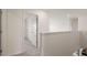 Upstairs hallway with gray carpet at 1119 Blue Juniper Circle, Loganville, GA 30052
