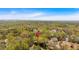 Panoramic aerial view showcasing the property's location surrounded by verdant trees and other residential areas at 115 Mount Paran Rdg, Atlanta, GA 30327