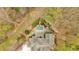 Aerial view of a luxury home with a private pool and meticulously landscaped backyard oasis at 115 Mount Paran Rdg, Atlanta, GA 30327