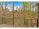 Private balcony overlooking a serene wooded backyard setting at 115 Mount Paran Rdg, Atlanta, GA 30327