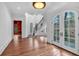 Grand foyer featuring wood floors, high ceilings, and a staircase with wrought iron railing at 115 Mount Paran Rdg, Atlanta, GA 30327