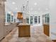 Luxury kitchen featuring a center island, marble countertops, and high-end stainless steel appliances at 115 Mount Paran Rdg, Atlanta, GA 30327