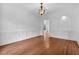 Stylish living room features hardwood floors, wainscoting and an open floor plan at 115 Mount Paran Rdg, Atlanta, GA 30327