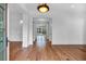 Spacious living room boasts hardwood floors and large windows, filling the room with natural light at 115 Mount Paran Rdg, Atlanta, GA 30327