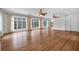 Spacious living room with hardwood floors, large windows, and abundant natural light at 115 Mount Paran Rdg, Atlanta, GA 30327