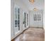 Well-lit room with tile floors, white walls, and windows at 115 Mount Paran Rdg, Atlanta, GA 30327