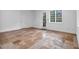 Spacious room featuring neutral tile flooring, white walls, and glass door at 115 Mount Paran Rdg, Atlanta, GA 30327