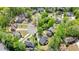 Aerial view of the home surrounded by lush green trees at 3130 Crestmont Nw Way, Kennesaw, GA 30152