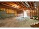Unfinished basement featuring exposed wood rafters, concrete walls and floor and a utility hookup at 3130 Crestmont Nw Way, Kennesaw, GA 30152