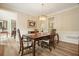 Formal dining room featuring hardwood floors and a chandelier at 3130 Crestmont Nw Way, Kennesaw, GA 30152