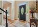 Elegant entryway with wood floors and decorative front door, offering a warm welcome at 3130 Crestmont Nw Way, Kennesaw, GA 30152