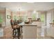 Spacious kitchen with a breakfast bar, granite countertops, stainless appliances, and eat-in breakfast nook at 3130 Crestmont Nw Way, Kennesaw, GA 30152