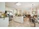 Open floor plan kitchen leading into the living room with stainless steel appliances and granite countertops at 3130 Crestmont Nw Way, Kennesaw, GA 30152