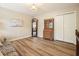 Living room featuring wood laminate flooring and antique furniture at 3130 Crestmont Nw Way, Kennesaw, GA 30152
