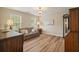 Bright living room boasts laminate flooring and a traditional furniture arrangement at 3130 Crestmont Nw Way, Kennesaw, GA 30152