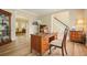Cozy office space with wood floors, a vintage desk, and natural light at 3130 Crestmont Nw Way, Kennesaw, GA 30152