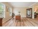 Bright home office featuring wood floors, crown molding, and natural light at 3130 Crestmont Nw Way, Kennesaw, GA 30152