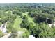 Expansive aerial view of the community showcasing lush green spaces, golf courses, and tree-lined streets at 41 Cantey Nw Pl, Atlanta, GA 30327