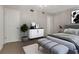 Relaxing bedroom featuring a neutral color scheme, contemporary furnishings, and plenty of natural light at 41 Cantey Nw Pl, Atlanta, GA 30327