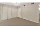 Spacious bedroom with carpet flooring, closet, and neutral paint color at 41 Cantey Nw Pl, Atlanta, GA 30327