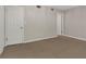 Neutral bedroom with carpet flooring, closet, and ensuite bathroom entrance at 41 Cantey Nw Pl, Atlanta, GA 30327