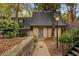 Charming brick home with well-maintained landscaping and exterior staircase at 41 Cantey Nw Pl, Atlanta, GA 30327
