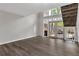 Bright living room with hardwood floors and double doors leading to a patio at 41 Cantey Nw Pl, Atlanta, GA 30327