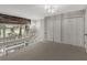 Spacious loft area with natural light, closet, and view of the trees at 41 Cantey Nw Pl, Atlanta, GA 30327