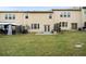 The backyard features a grassy yard, wooden fences, and a patio at 5556 Cascade Sw Run, Atlanta, GA 30336