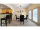 Cozy dining area with access to the kitchen and outdoor patio at 5556 Cascade Sw Run, Atlanta, GA 30336