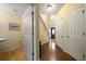Inviting entryway with hardwood floors and staircase at 5556 Cascade Sw Run, Atlanta, GA 30336