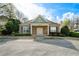 Charming brick home with well-manicured landscaping and a classic design at 5556 Cascade Sw Run, Atlanta, GA 30336