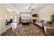 Inviting living room features a fireplace and access to a dining area at 5556 Cascade Sw Run, Atlanta, GA 30336