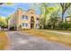 Exterior shot of an apartment building with trees and a walkway at 70 Sheridan Ne Dr # 10, Atlanta, GA 30305