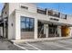 Commercial building with a brick facade, awnings, and street-front parking, showcasing retail and restaurant spaces at 70 Sheridan Ne Dr # 10, Atlanta, GA 30305