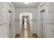Well-maintained hallway with detailed wall texture and classic architectural design, leading to a naturally lit doorway at 70 Sheridan Ne Dr # 10, Atlanta, GA 30305