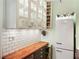 Spacious kitchen, highlighting custom cabinetry with glass fronts and built-in spice racks at 70 Sheridan Ne Dr # 10, Atlanta, GA 30305