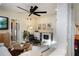 Inviting living room features a modern fireplace, ceiling fan, and comfortable seating at 70 Sheridan Ne Dr # 10, Atlanta, GA 30305