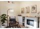 Comfortable living room with a fireplace, decorative art, and a cozy reading nook at 70 Sheridan Ne Dr # 10, Atlanta, GA 30305