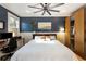 Spacious main bedroom with a ceiling fan, custom closet, and natural lighting at 70 Sheridan Ne Dr # 10, Atlanta, GA 30305