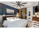 Inviting main bedroom featuring a ceiling fan, large window, and closet at 70 Sheridan Ne Dr # 10, Atlanta, GA 30305