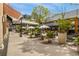 Outdoor restaurant seating with umbrellas, plants, and comfortable lounge areas at 70 Sheridan Ne Dr # 10, Atlanta, GA 30305