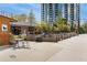 Outdoor seating area for restaurant, featuring tables, chairs, and a fountain at 70 Sheridan Ne Dr # 10, Atlanta, GA 30305