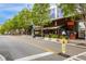 Street view of a neighborhood Taverna with outdoor seating and pedestrian access at 70 Sheridan Ne Dr # 10, Atlanta, GA 30305